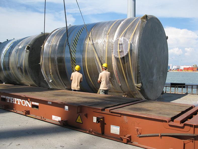 Popular Pack workers are working in a port for tank transfer job.